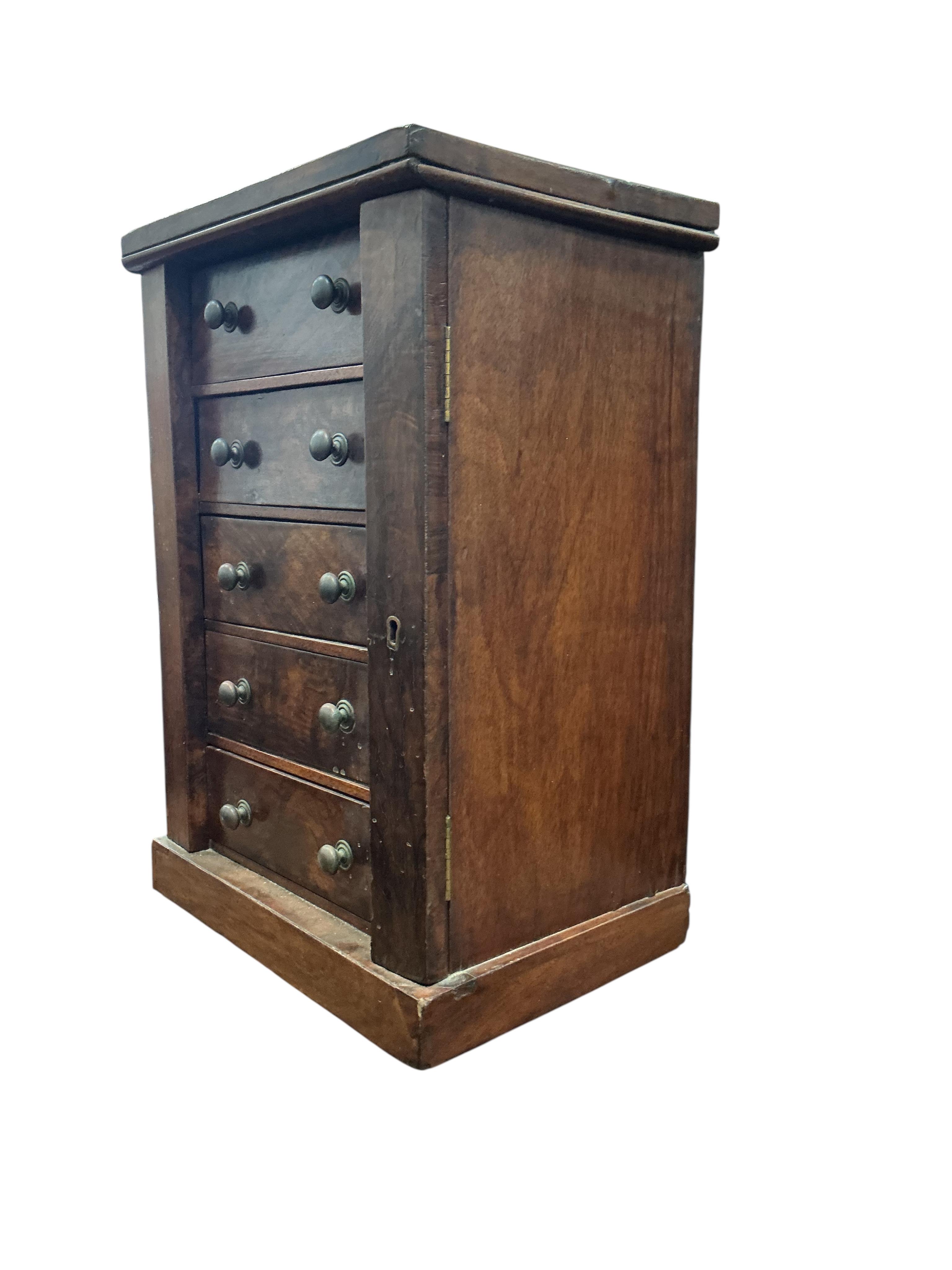 A Victorian walnut miniature wellington chest, width 35cm, depth 27cm, height 52cm